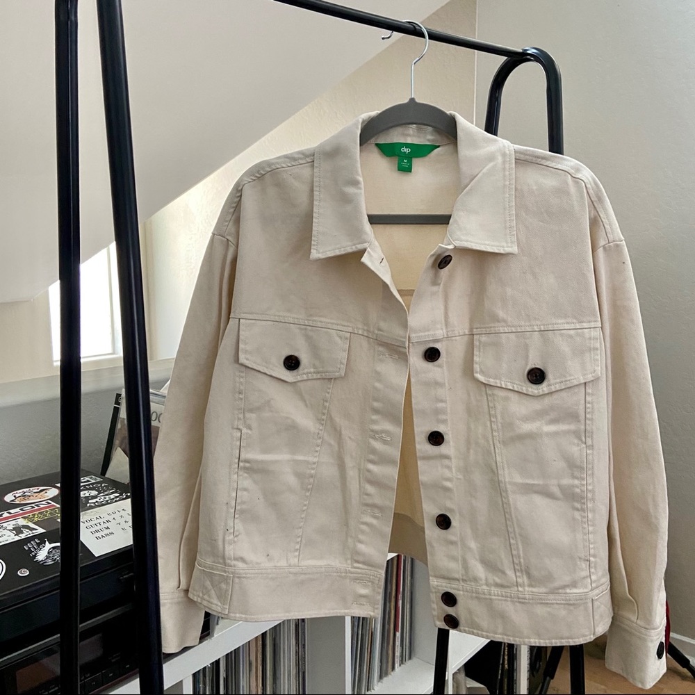 cream colored denim jacket